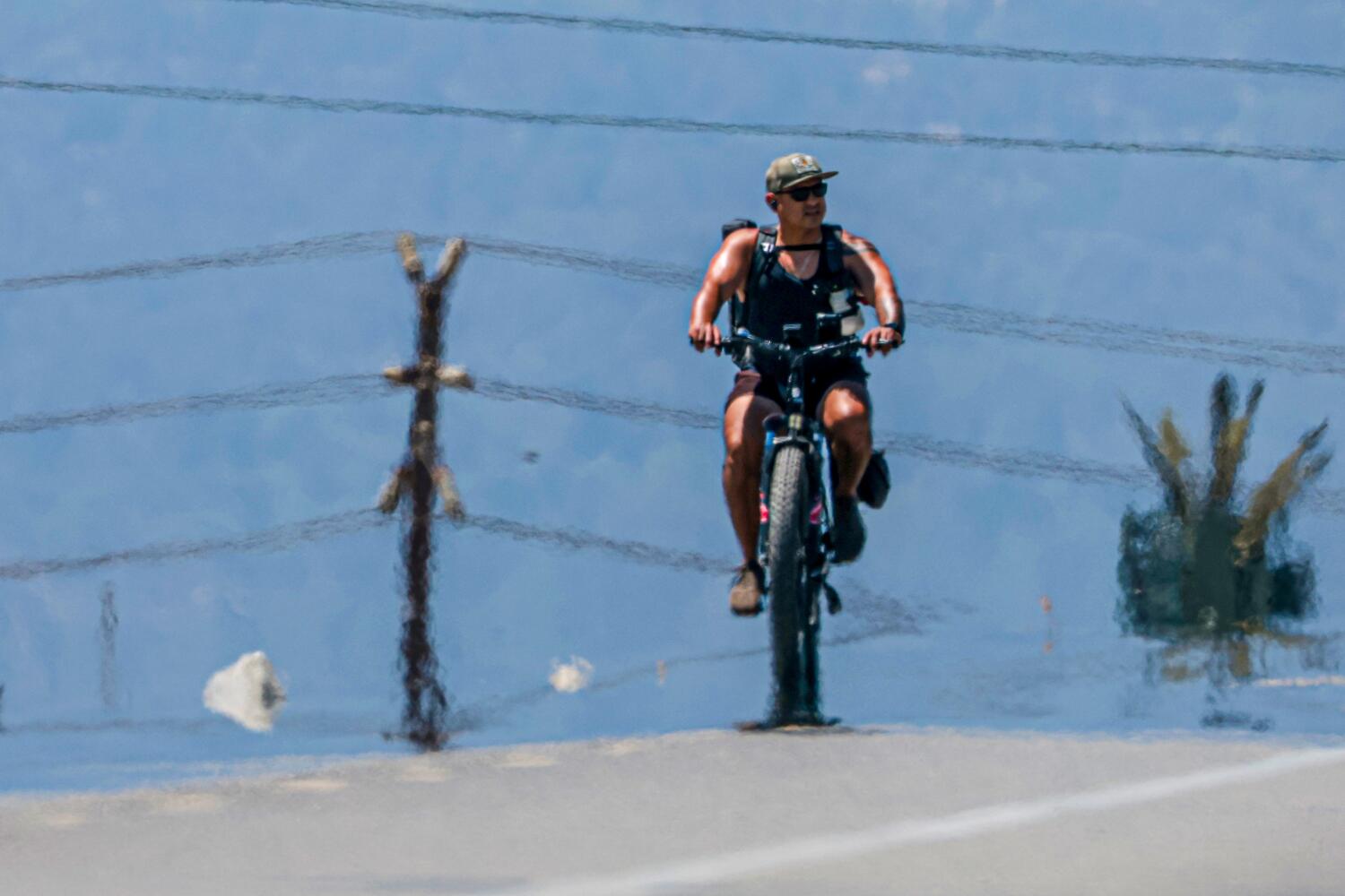 Source-feed image associated with L.A.'s muggy misery: Intense humidity makes summer heat even more unbearable
