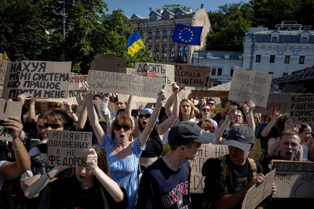 Source-feed image associated with Ukrainians protest Zelenskyy's ouster of his popular defense minister