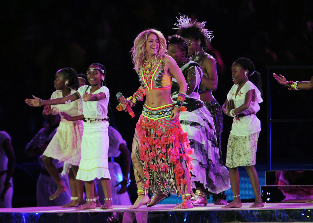 Source-feed image associated with What makes a winning World Cup anthem? Shakira, Wyclef Jean and others explain