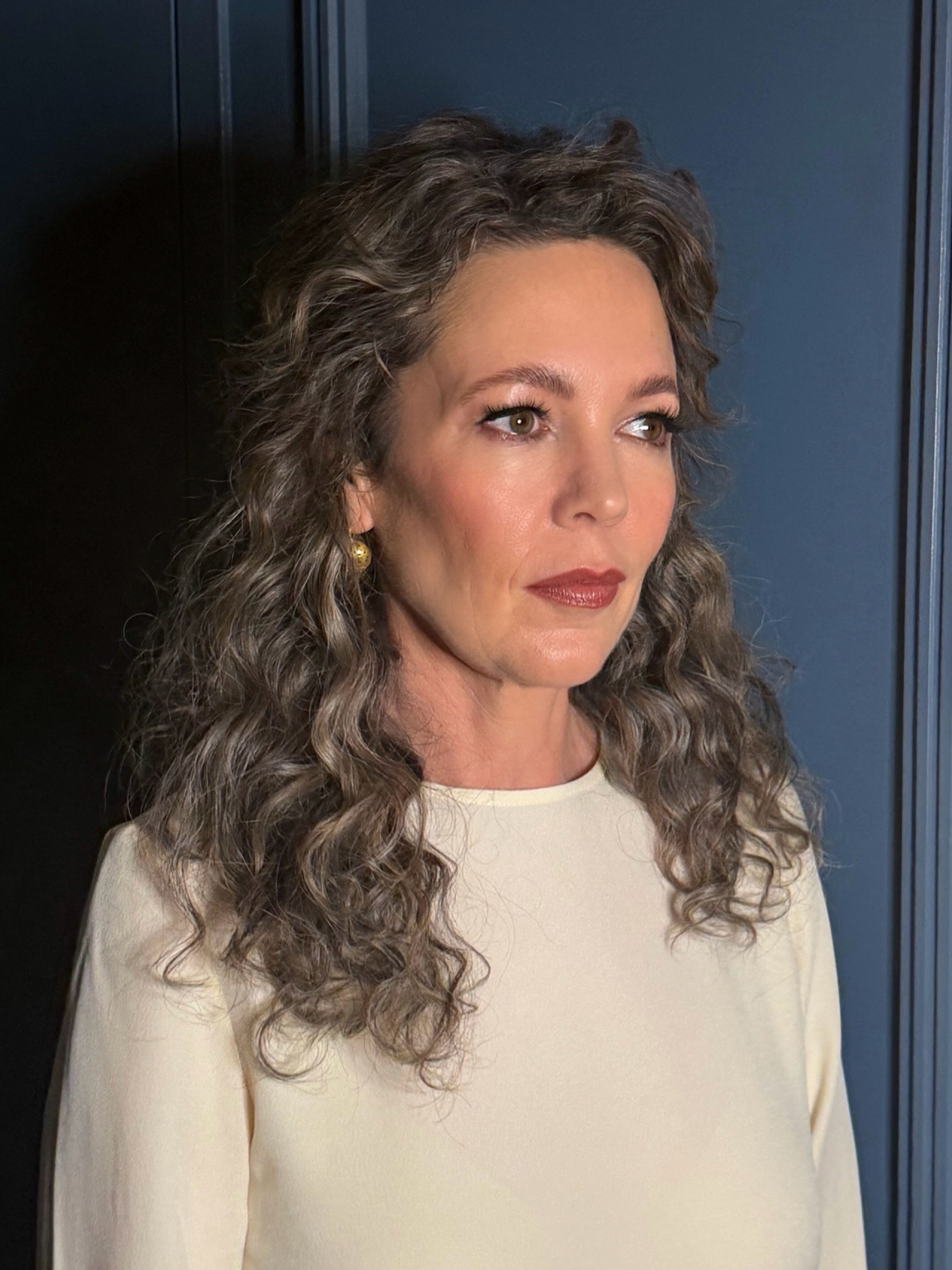 Image from linked report: How to Get Olivia Colman’s “Wild and Sexy” Curls