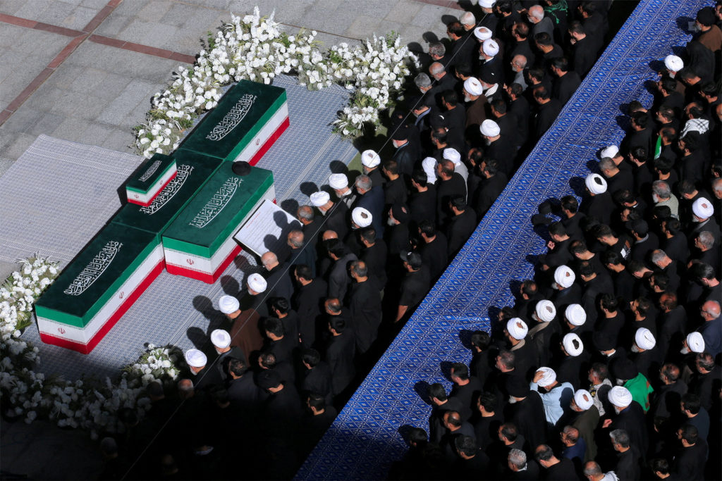 Source-feed image associated with Khamenei's other sons appear at his funeral in Iran as new supreme leader remains in hiding