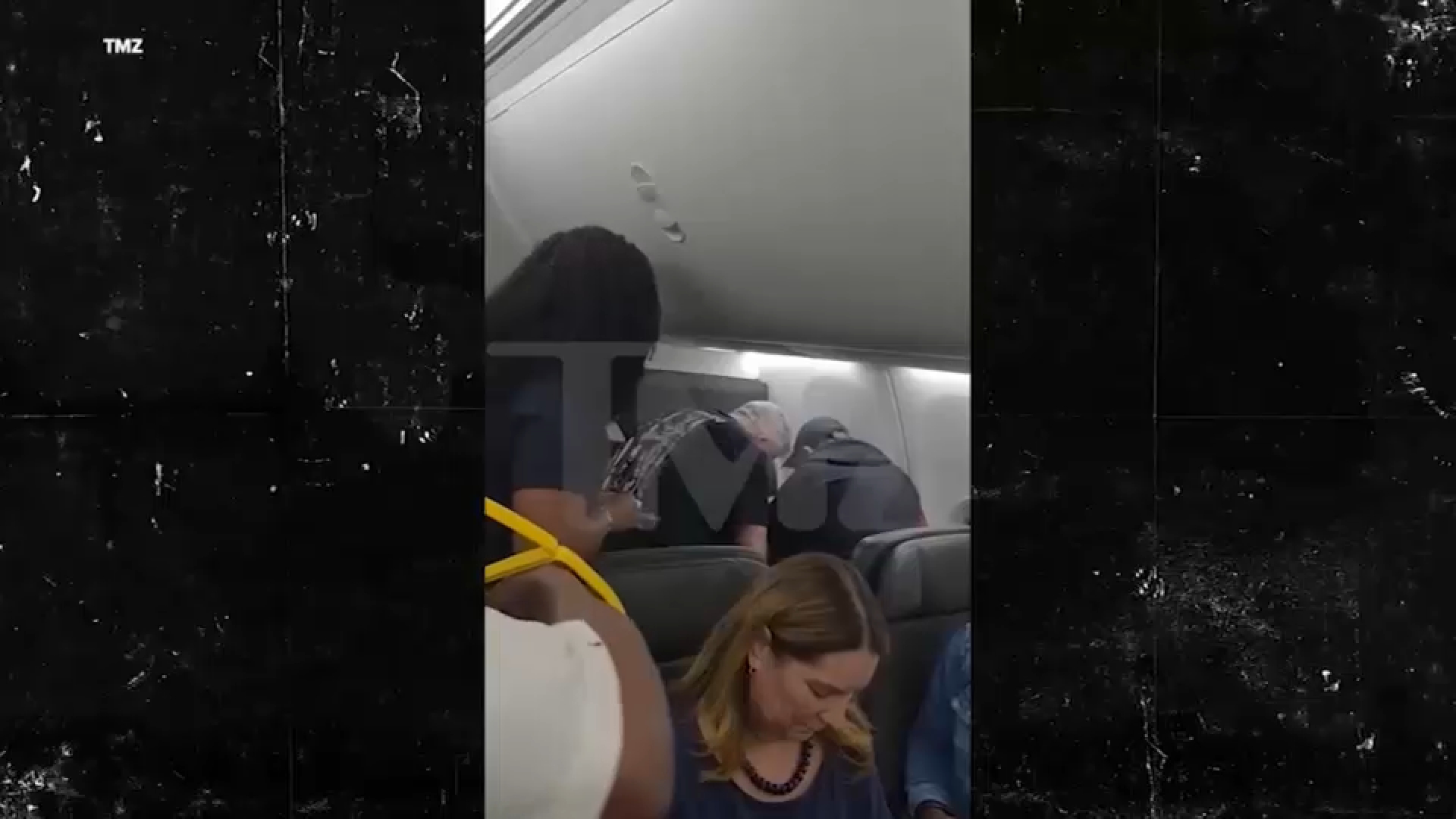 Source-feed image associated with Travelers recount restraining unruly passenger on American Airlines flight to Newark