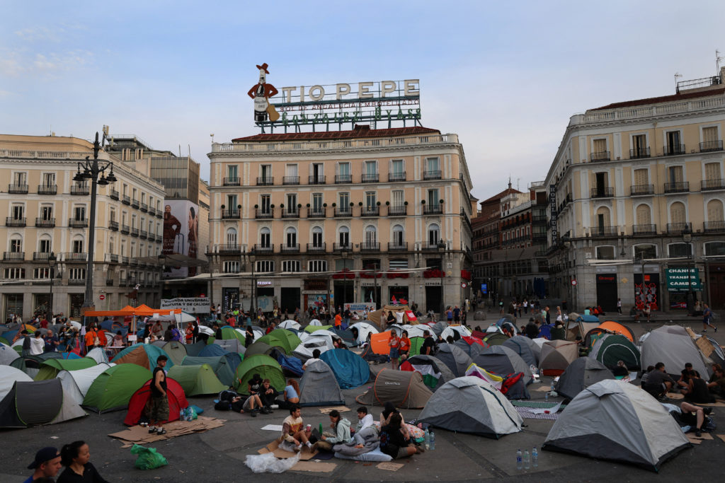 Image from linked report: Eviction of 87-year-old sparks encampment protest in Madrid over housing crisis