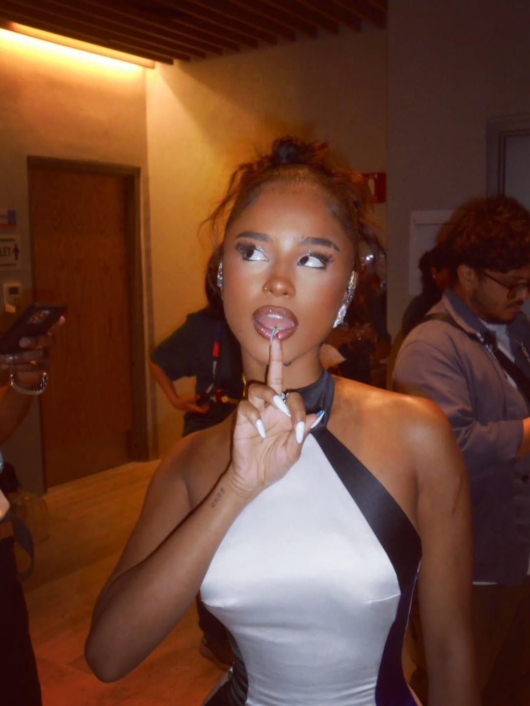 Source-feed image associated with Tyla Wore Her National Pride on Her Nails for the FIFA World Cup Opening Ceremony
