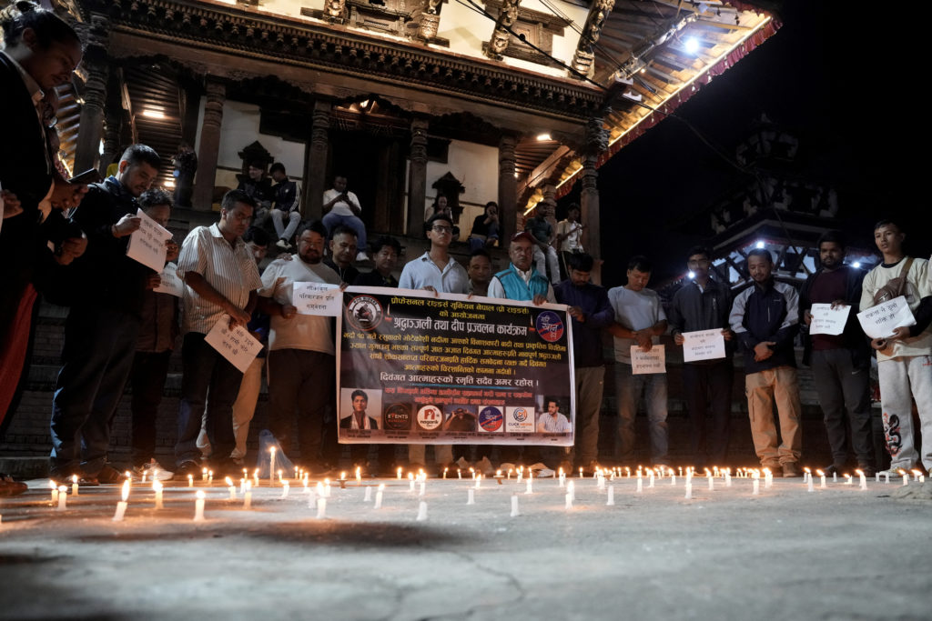 Source-feed image associated with Nepal holds a day of mourning after floods kill at least 1,300 people