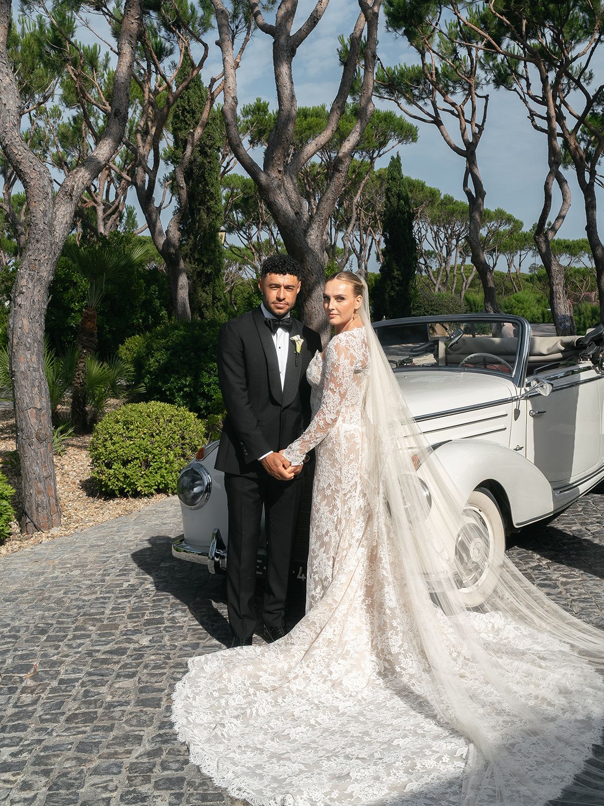 Source-feed image associated with Former Little Mix Member Perrie Edwards Wore Three White Dresses to Marry Footballer Alex Oxlade-Chamberlain in Portugal