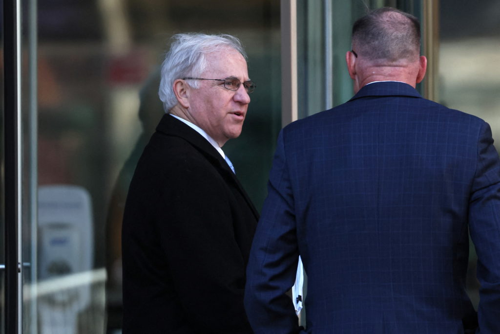 Source-feed image associated with Trump pardons former Republican congressman convicted of insider trading