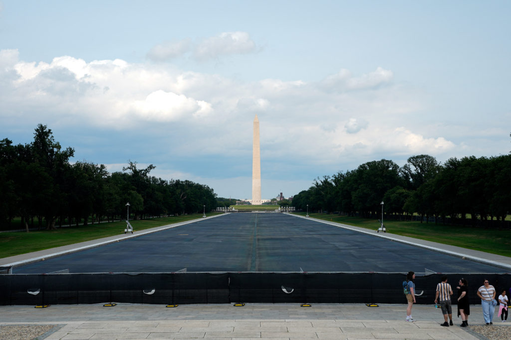 Source-feed image associated with Justice Department drops criminal case against Olympian over damaged Reflecting Pool