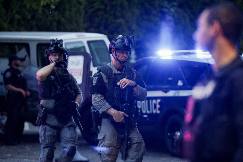 Source-feed image associated with Police say bullets that killed 2 at Seattle festival were not fired from arrested teen's gun