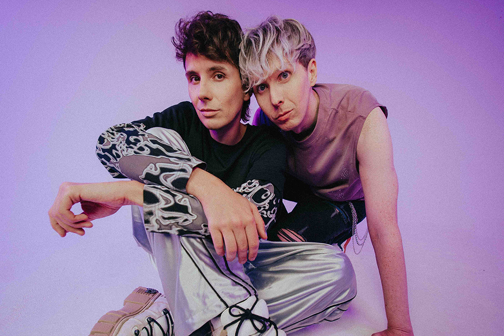Source-feed image associated with Dan and Phil on Going Back on Tour After Finally Revealing Their Relationship: ‘We Just Want to Go on Stage and Be Completely Ourselves’ (EXCLUSIVE)