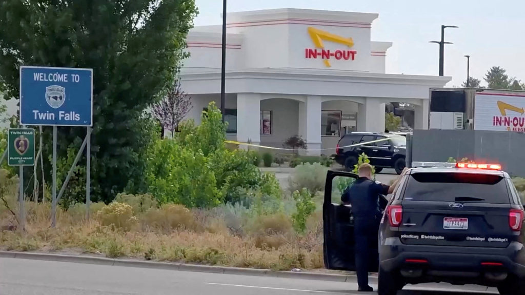 Source-feed image associated with Police release video showing gunman shooting victims at Idaho In-N-Out Burger drive-thru
