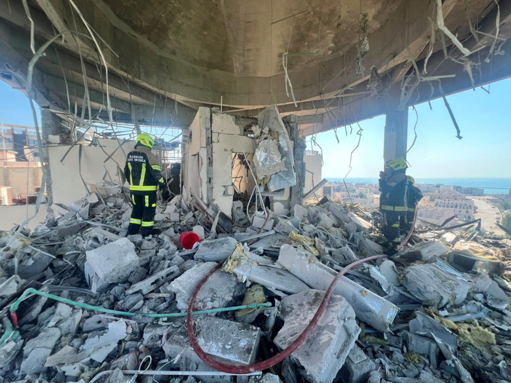 Source-feed image associated with Iran attacks Bahrain and Kuwait following U.S. strikes and threatens to halt talks