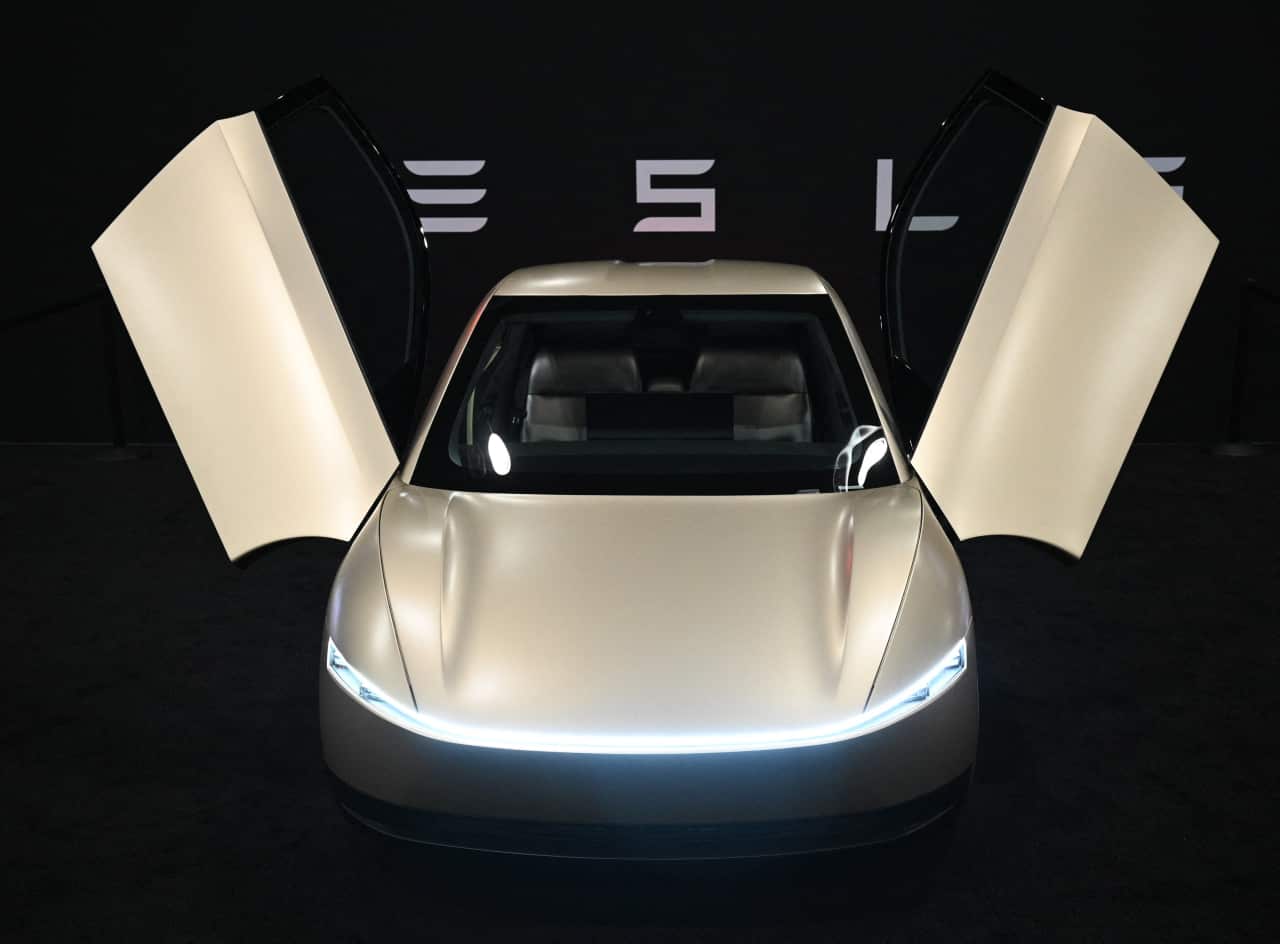 Source-feed image associated with Tesla’s stock among S&P 500’s top gainers as investors prepare for a Cybercab launch