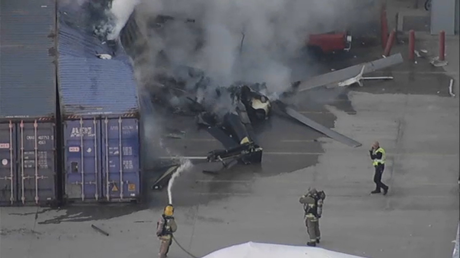 Source-feed image associated with Driver who slammed into LA bus before news helicopter crash to face murder charges, prosecutor says
