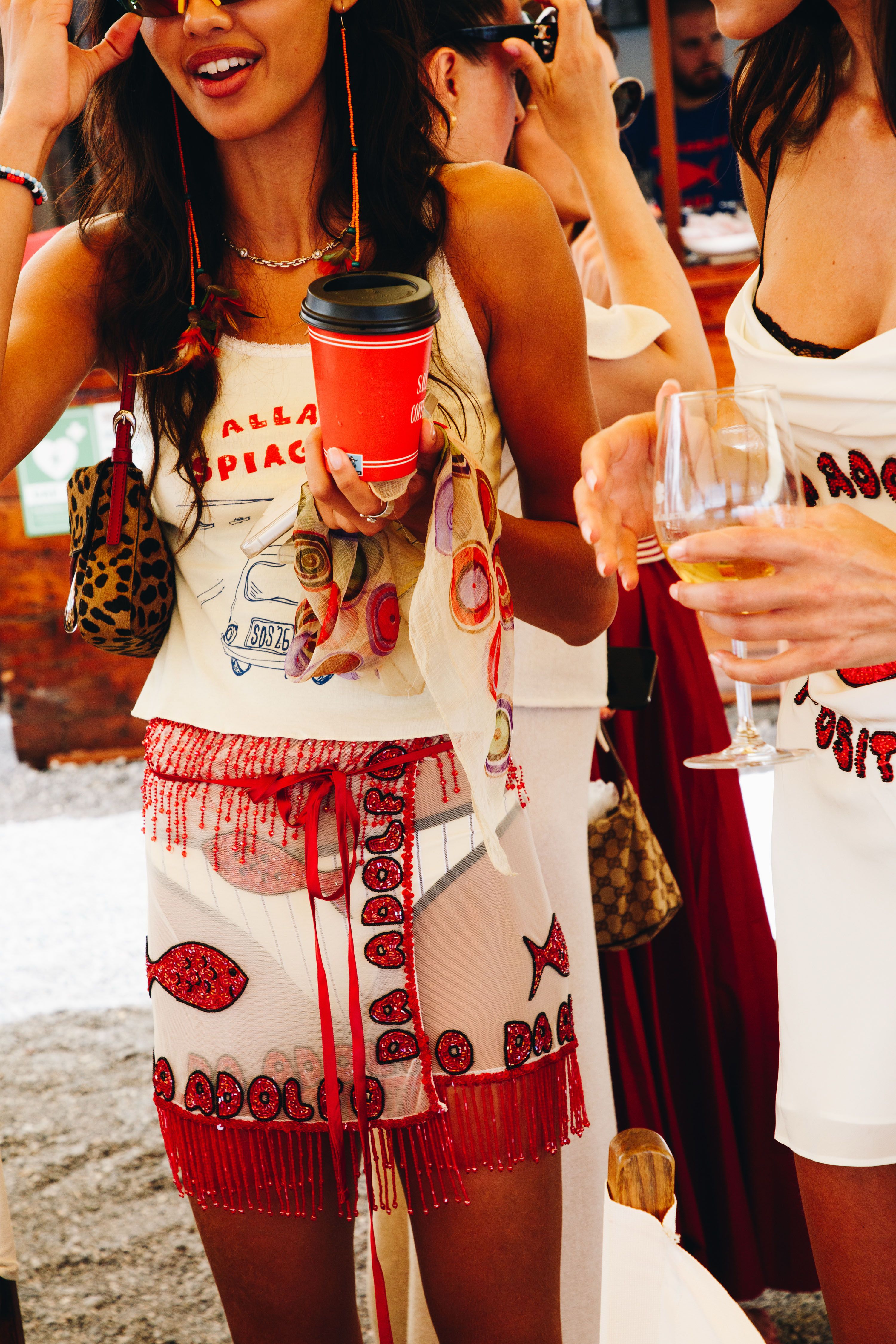 Source-feed image associated with Accessible Luxury Brands Are Taking a Slice of the Euro Summer Pie