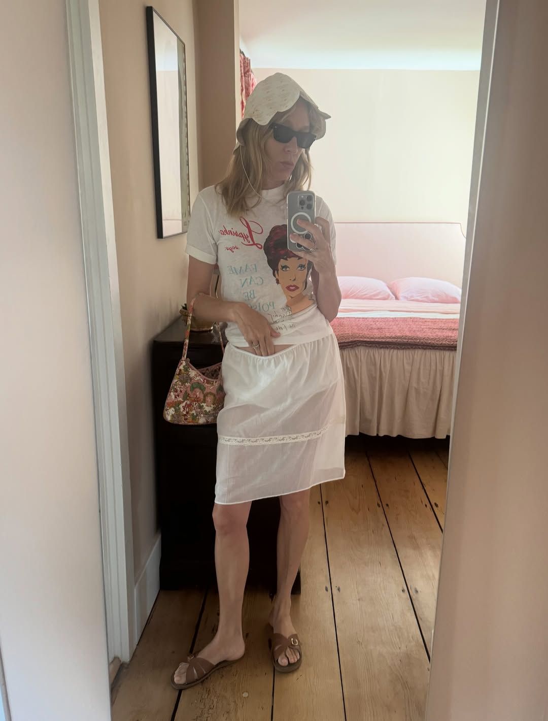 Source-feed image associated with Chloë Sevigny Takes This Cool Girl Skirt Trend for a Spin