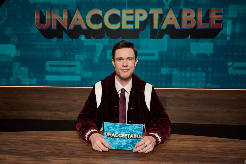 Source-feed image associated with Ed Gamble on His New Panel Show ‘Unacceptable’ and the State of U.K. Comedy: ‘There Are Hard Jobs Out There and Being a Comedian Is Absolutely Not One of Them’