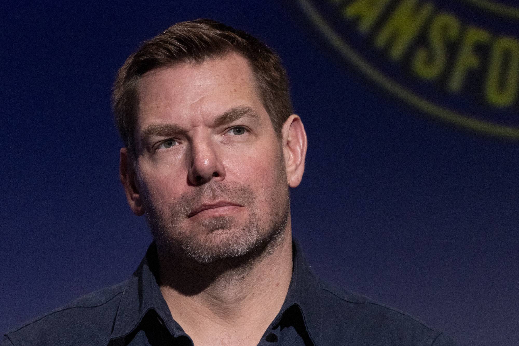 Source-feed image associated with Federal Agents Seize Eric Swalwell’s Devices, Search Home in Sexual Misconduct Probe