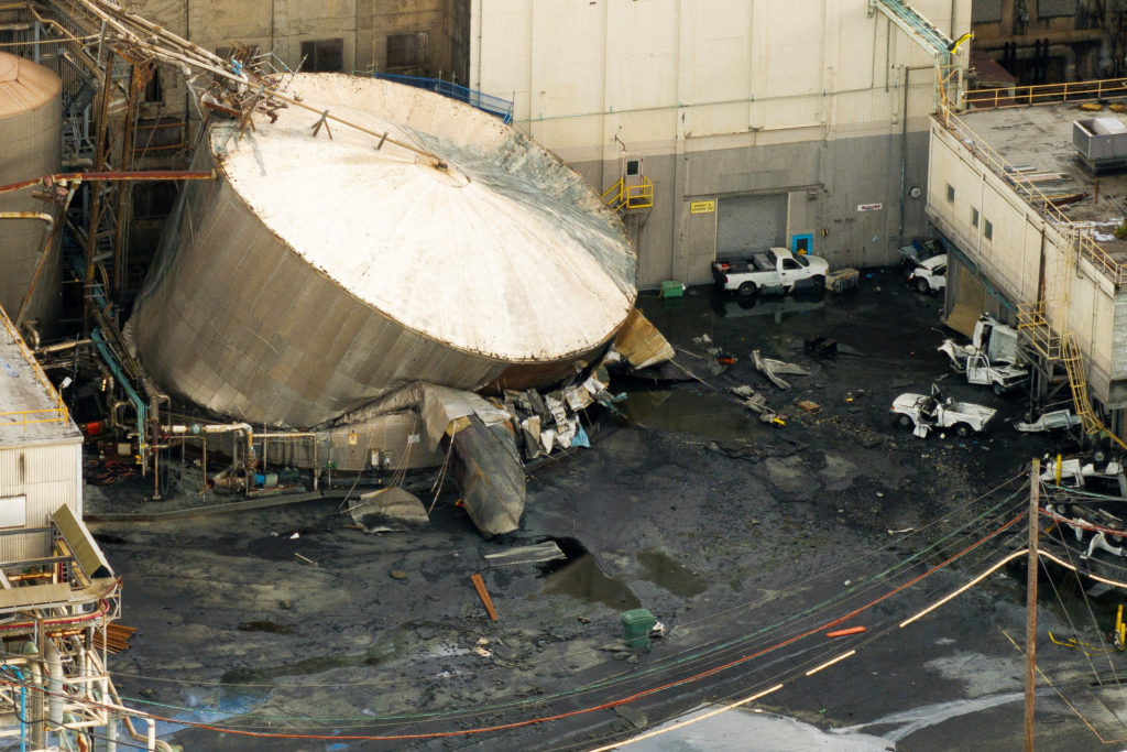Source-feed image associated with News Wrap: 11 presumed dead after Washington paper mill tank implosion
