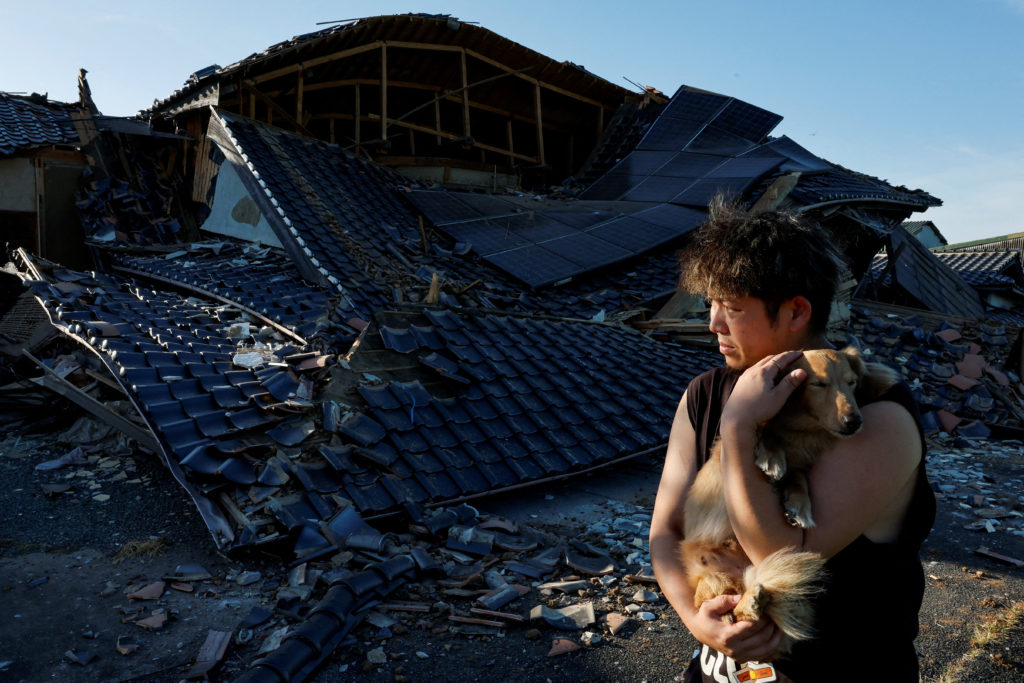 Source-feed image associated with Quake survivors in southwestern Japan sleep in cars in sweltering heat as death toll rises to 34