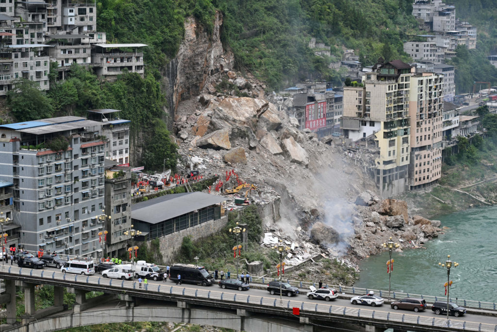 Source-feed image associated with Landslide in southwestern China kills at least 8 and leaves 34 missing