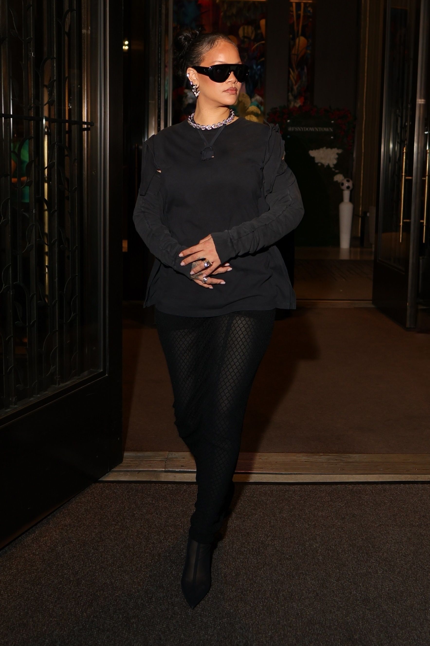 Source-feed image associated with Rihanna Has a Crisis of Pants in Paris and New York