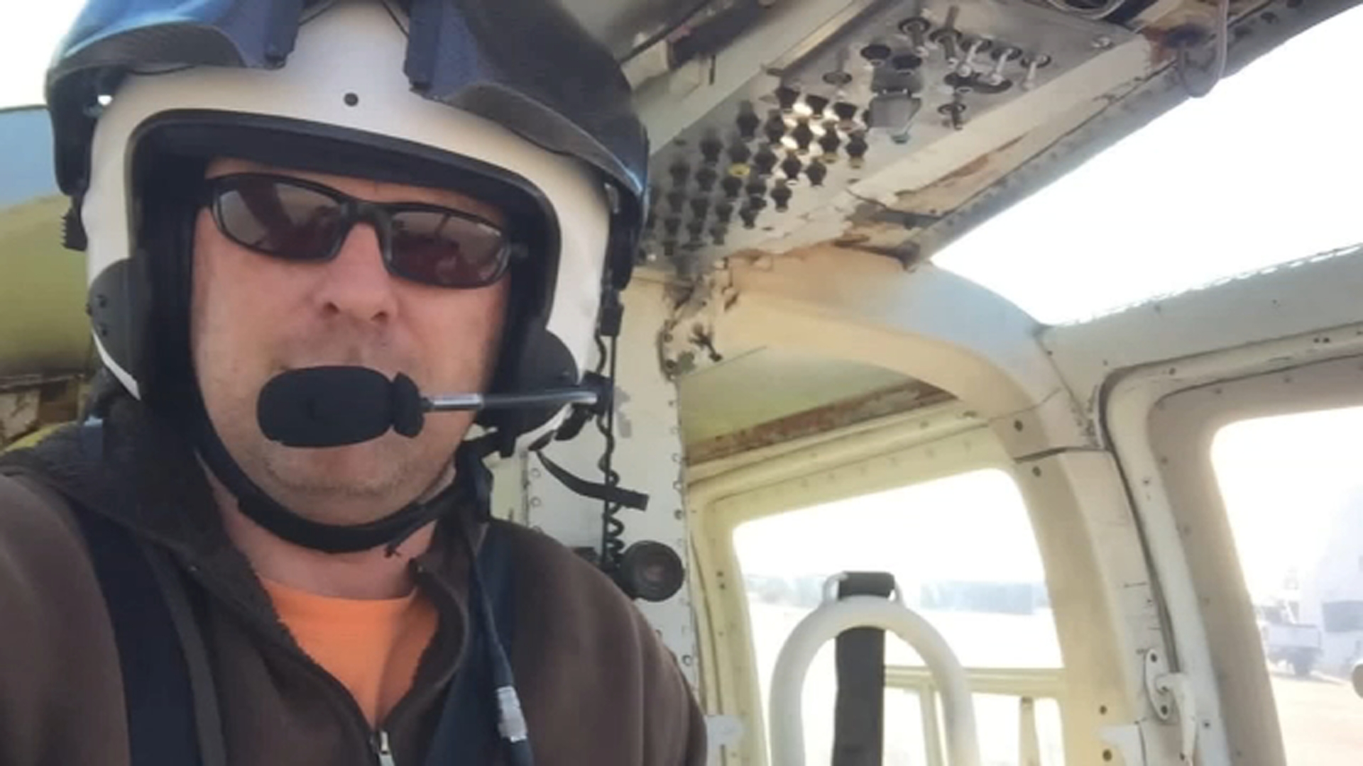 Source-feed image associated with CA pilot killed in helicopter crash while fighting Utah wildfire