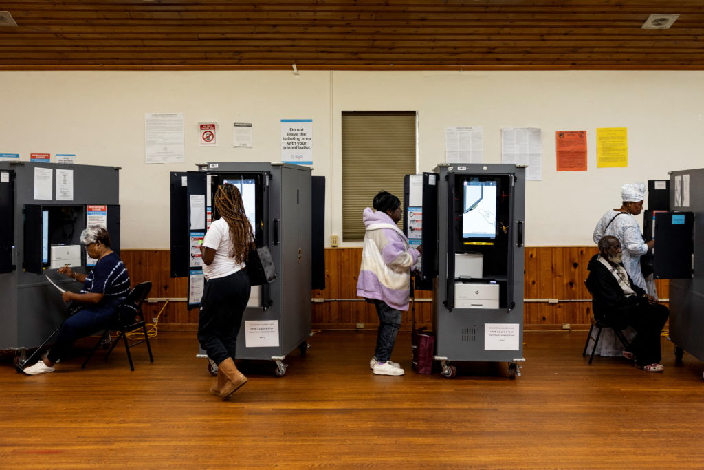 Source-feed image associated with The secret ballot has been an article of faith in U.S. elections. That's being tested in Georgia