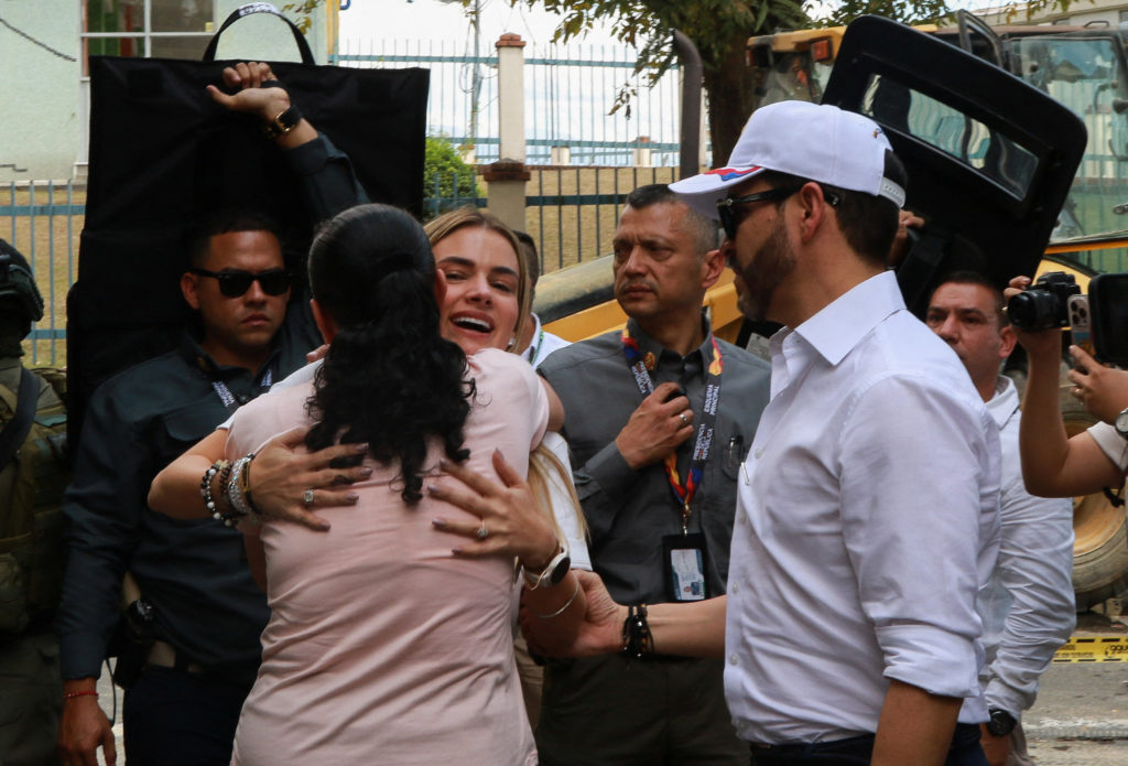 Source-feed image associated with As search for thousands of missing pushes on, Colombia earthquake tests new president