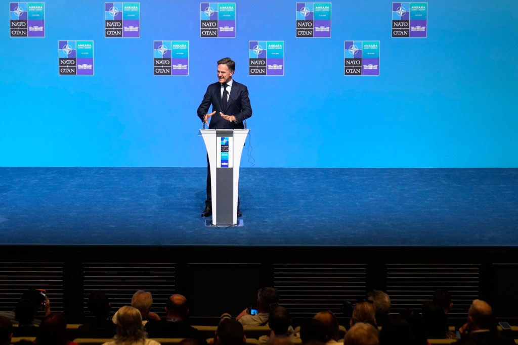 Source-feed image associated with NATO chief demands allies present credible plans to reach defense spending targets