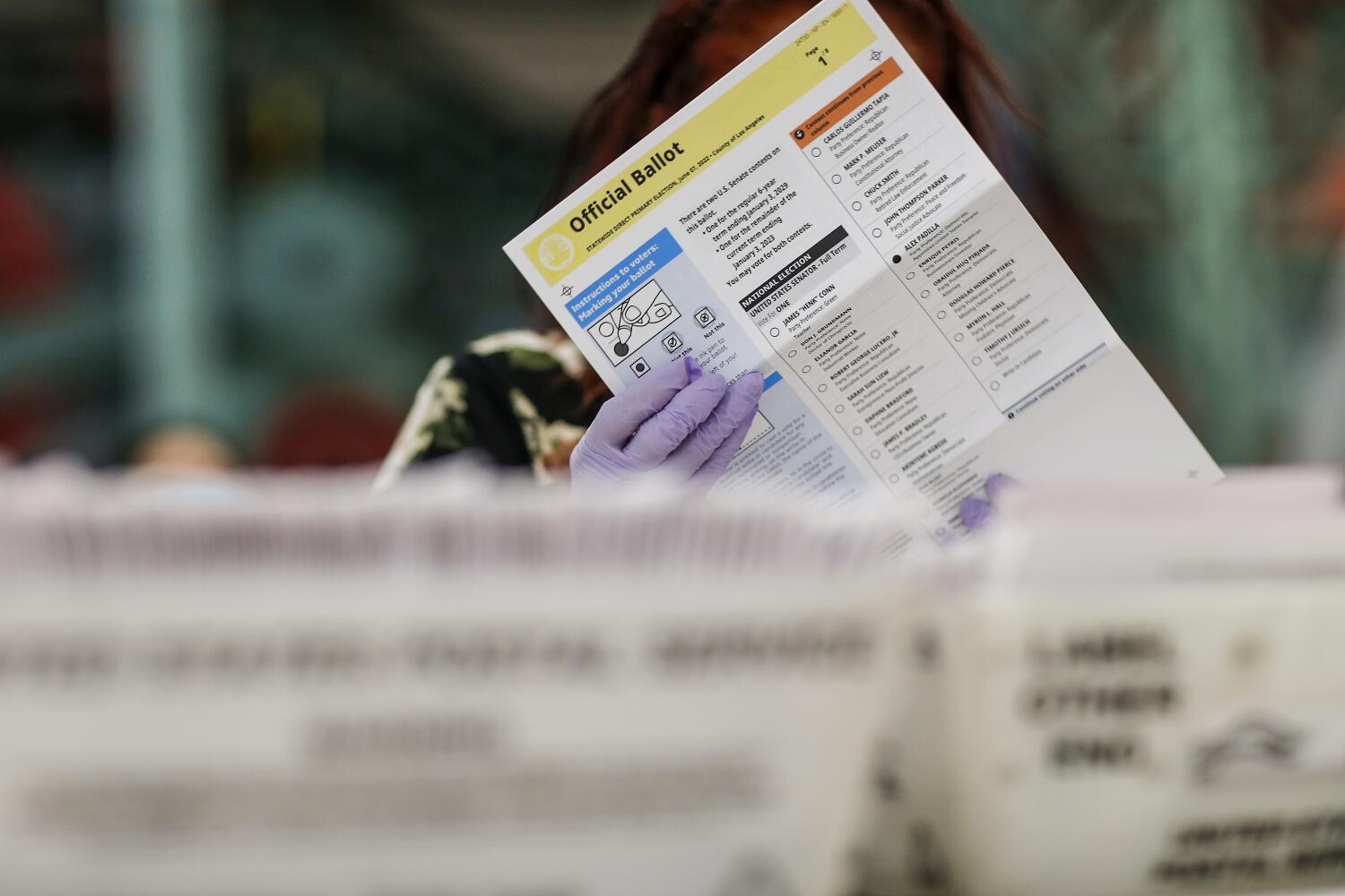 Source-feed image associated with California, other states sue again to block new Postal Service rules for mail ballots