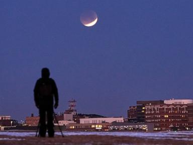 Source-feed image associated with Near-total lunar eclipse is coming up with the Americas in prime position