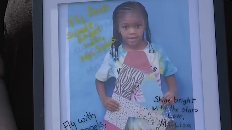Source-feed image associated with Mourners gather along Passaic River in New Jersey to remember two 10-year-old children who drowned, Mikey Klenk Jr. and Milian Dula