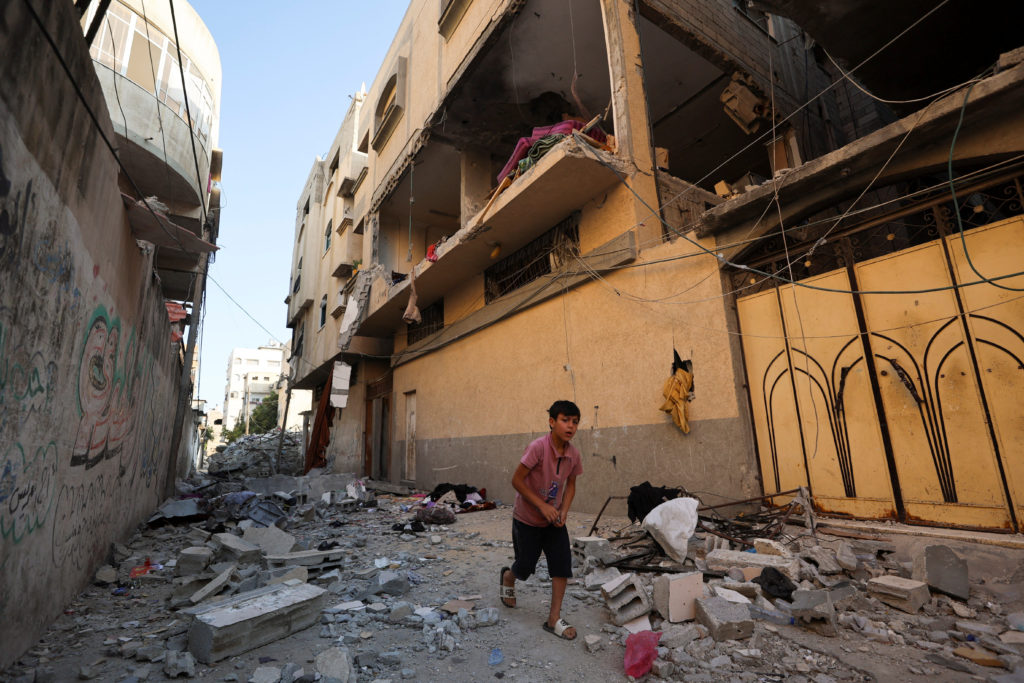 Source-feed image associated with Israeli strikes in Gaza kill 6, including 2 children and an Al Jazeera cameraman
