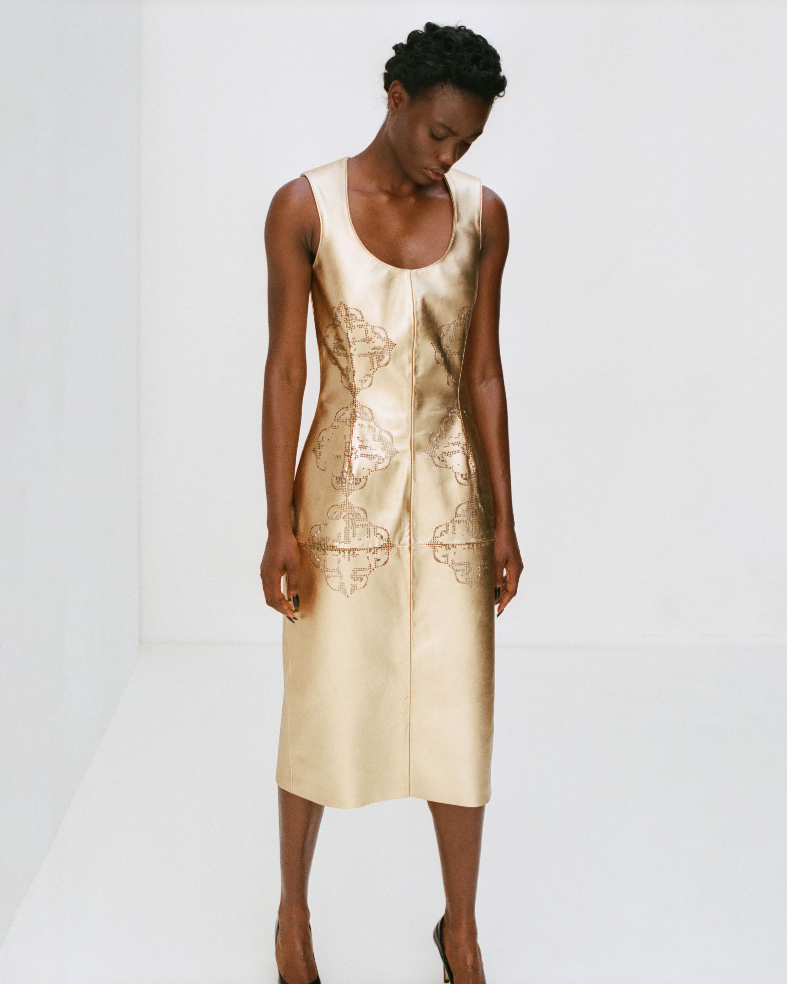 Image from linked report: For Joshua Ewusie, Faux Flowers and Leather Lace Explore the Politics of Taste