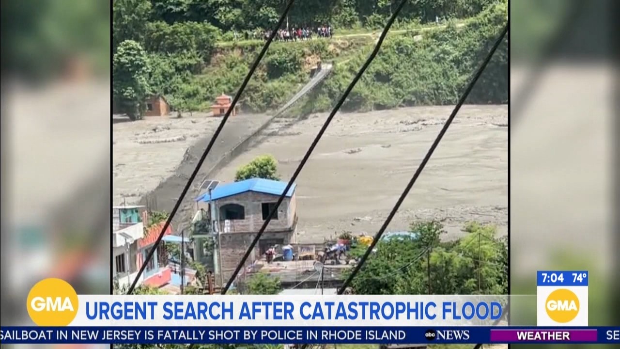 Source-feed image associated with Nepal-Tibet flood deaths rise to 358 amid search for hundreds of missing tourists
