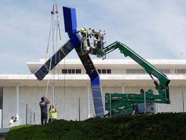 Source-feed image associated with Kennedy Center disassembles 'Blue' sculpture from its grounds