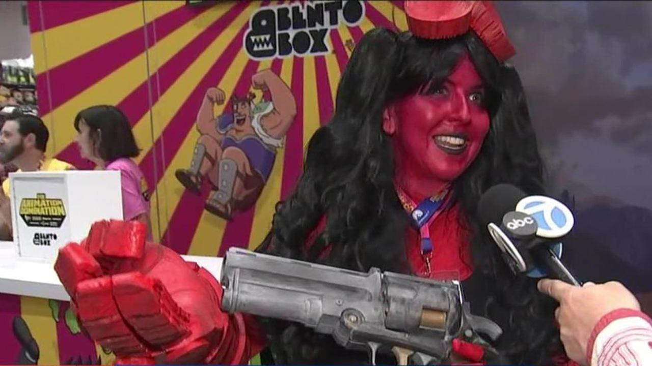 Source-feed image associated with Comic-Con fans line up for exclusive collectibles and show off epic costumes in San Diego