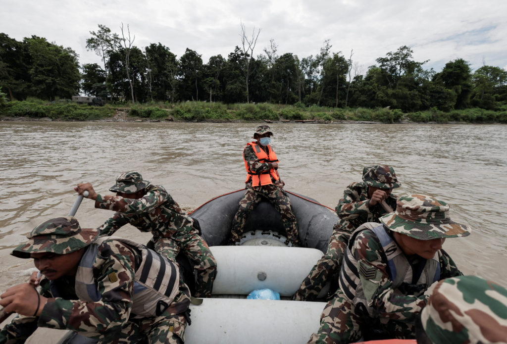 Source-feed image associated with The odds of survival for those trapped after Nepal flood, according to experts