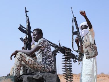 Source-feed image associated with US urges new UN sanctions to spur rivals in Sudan to negotiate an end to war