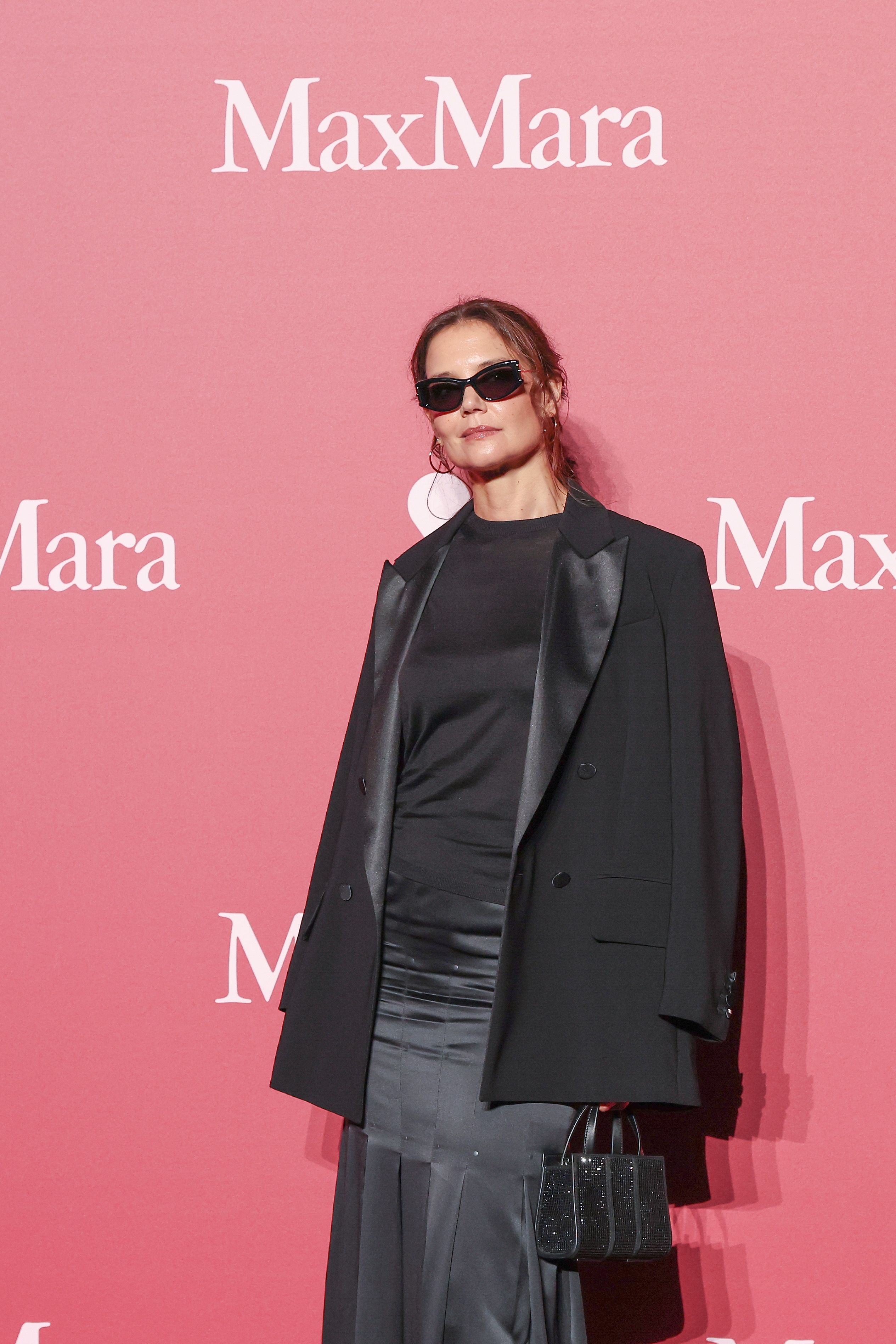 Source-feed image associated with Katie Holmes Embraces Summer Goth Mode