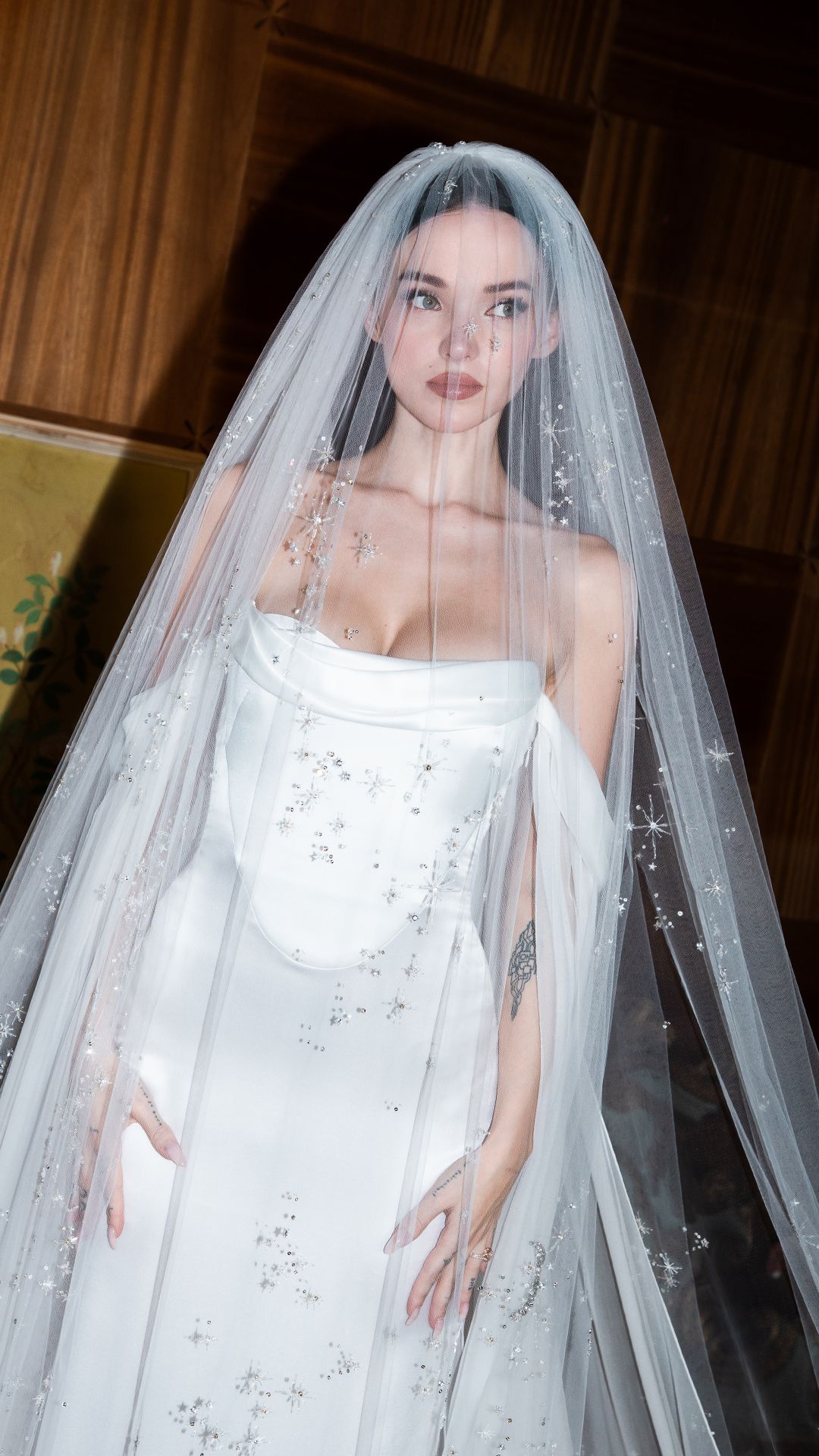 Image from linked report: Inside Dove Cameron’s Final Fitting for Her “Celestial” Valentino Wedding Dress in Rome