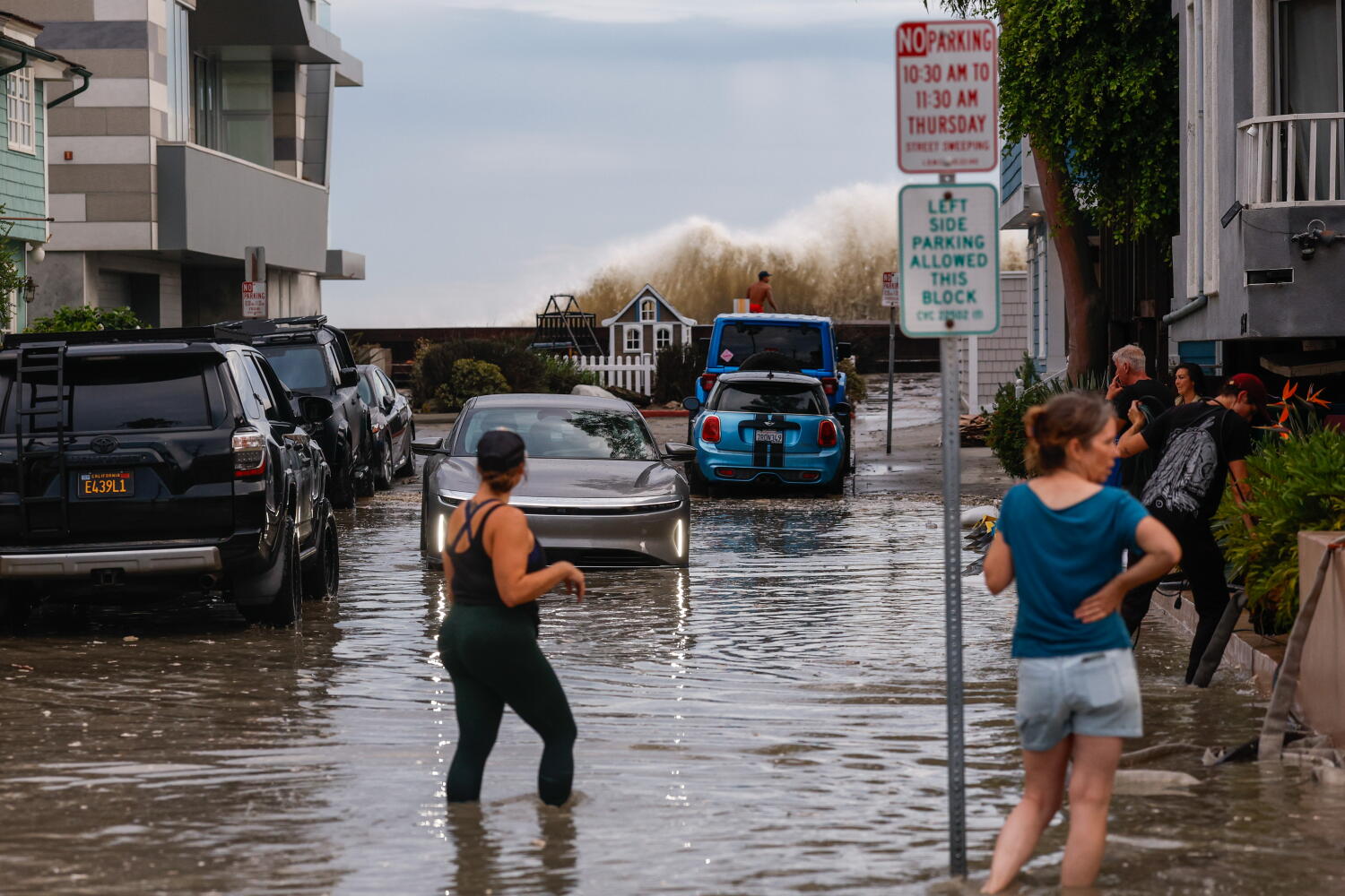 Source-feed image associated with Dozens of homes evacuated in Long Beach due to storm damage, high surf