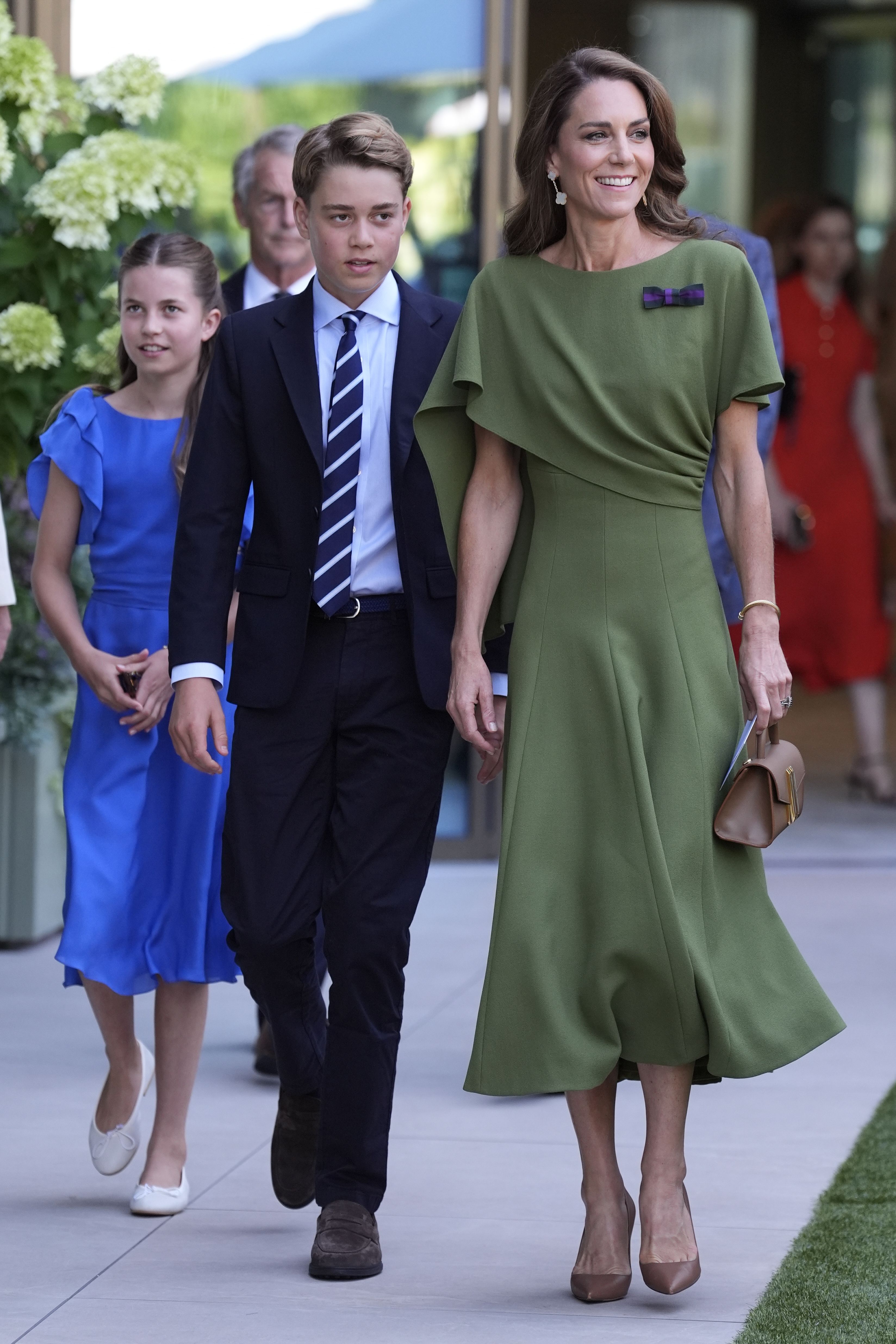 Source-feed image associated with Kate Middleton Sees Out Wimbledon 2026 in Grassy Green