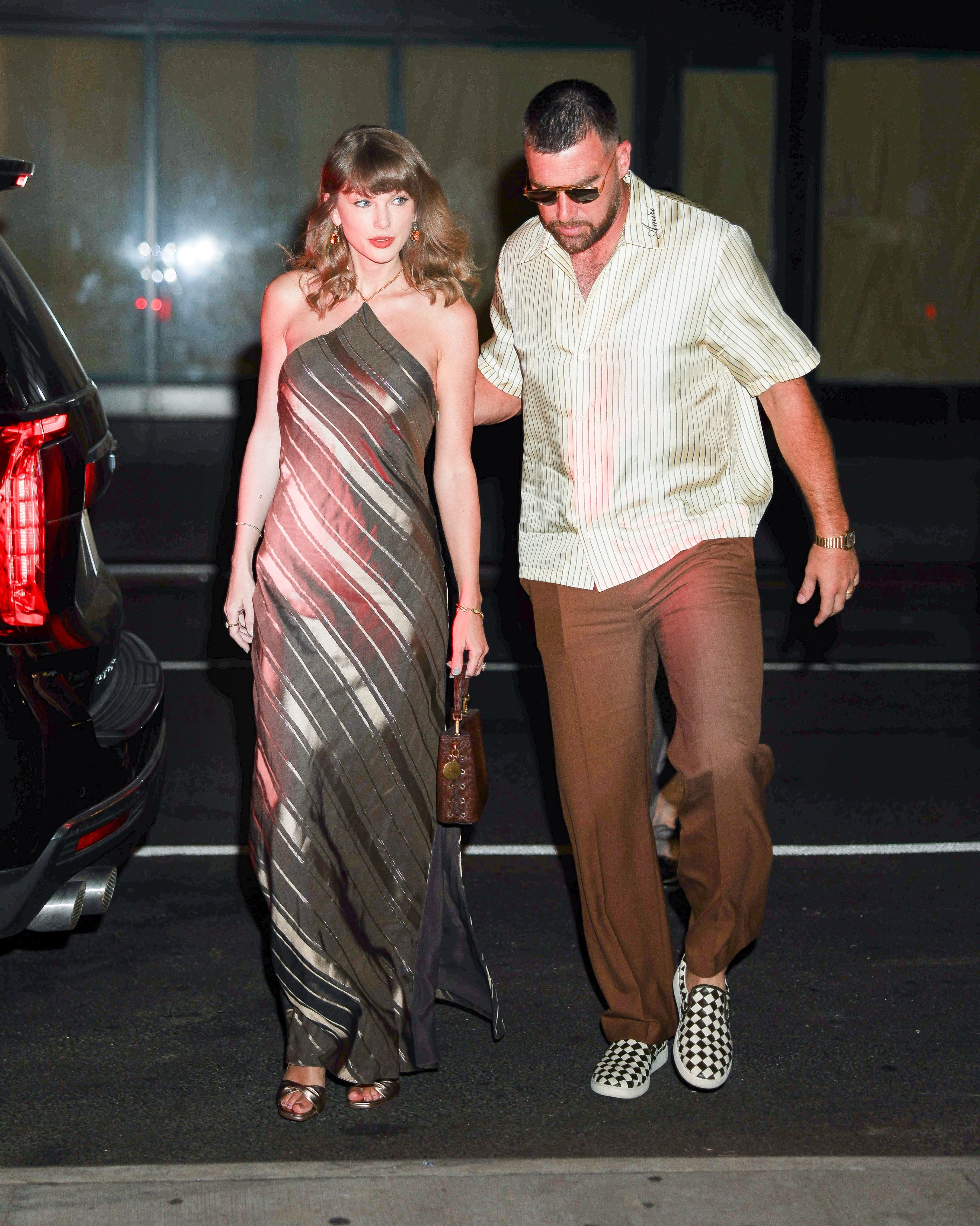 Source-feed image associated with Taylor Swift and Travis Kelce Step Out for Their First Newlywed Date Night