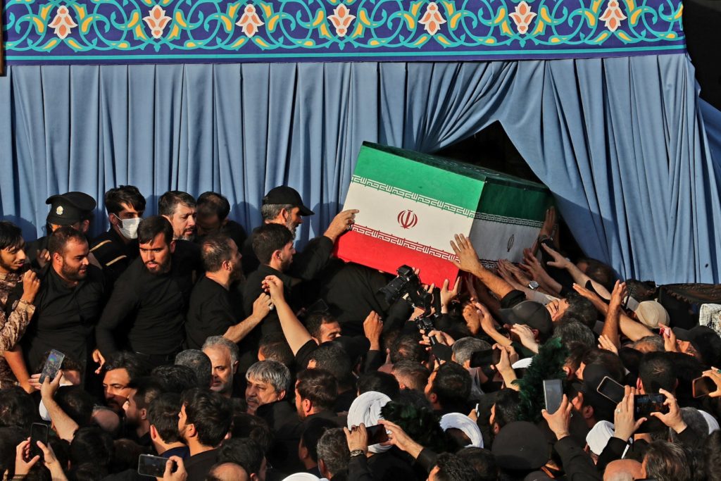 Source-feed image associated with Inside Iran as mourners honor Khamenei while critics remain quiet