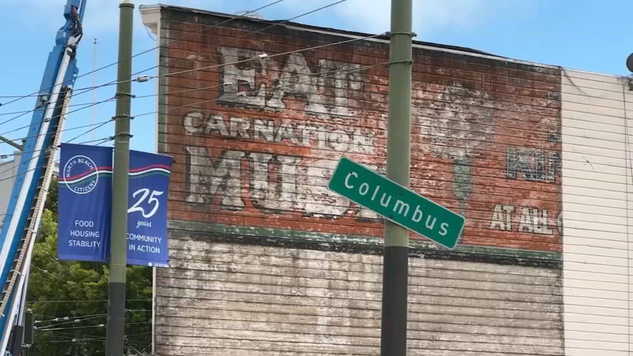 Source-feed image associated with Demolition exposes 100-year-old San Francisco ghost sign that was hidden for decades in North Beach