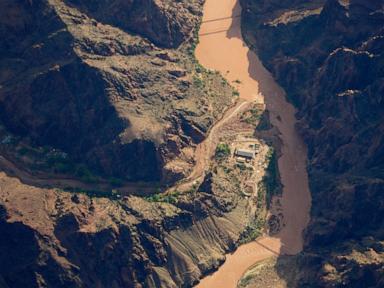 Source-feed image associated with Hikers describe intense rain and wind before floodwaters ravage Grand Canyon
