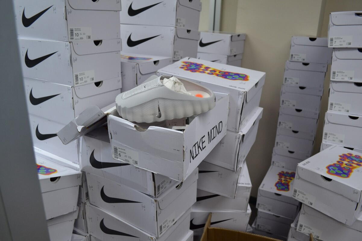 Source-feed image associated with $10 million in Adidas and Nike streetwear found at Arcadia warehouse, all fake, authorities say