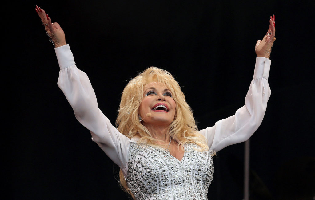 Source-feed image associated with Dolly Parton's greatest songs, and the stories behind them